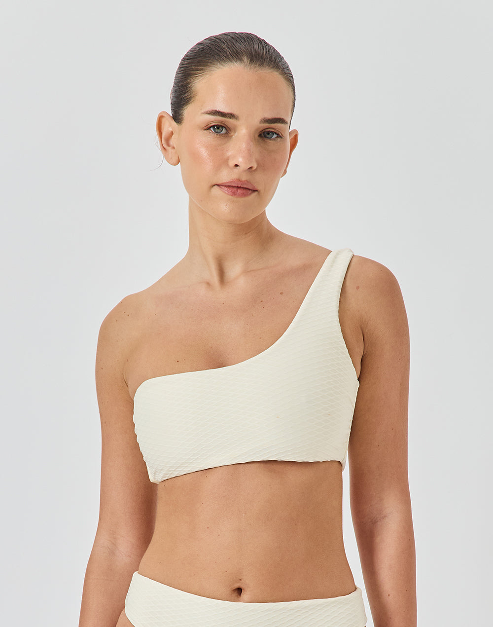 טופ ביקיני אסימטרי לבן שנהב PIPELINE