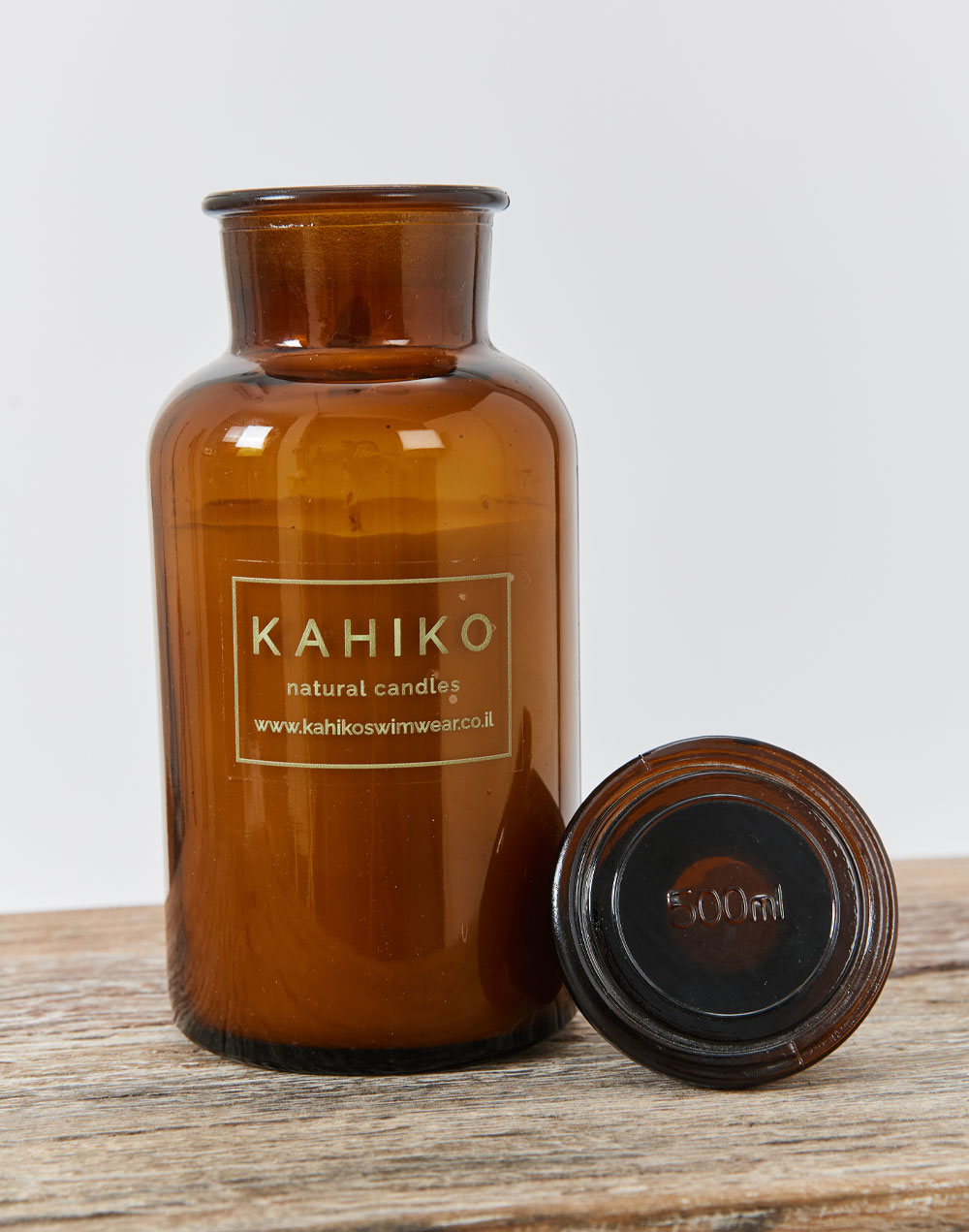 נר ריחני בבקבוק זכוכית בניחוח EBOONY WOODS